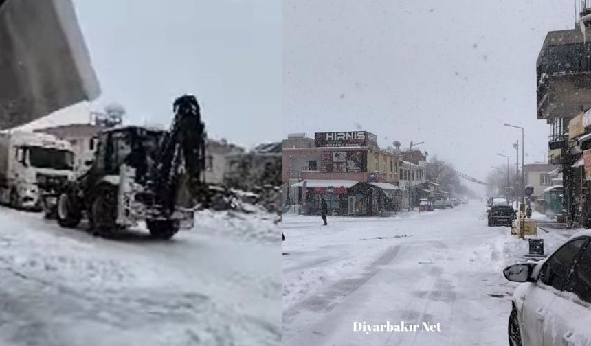 Dicle'de kar mücadelesi: Yokuşta mahsur kalan TIR'a müdahale